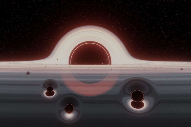 Illustrazione di uno sciame di piccoli buchi neri in un disco di gas in orbita attorno a un buco nero supermassiccio.